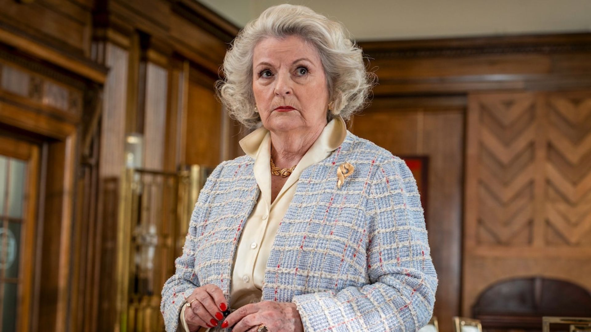 Brenda Blethyn looks across the room at something offscreen