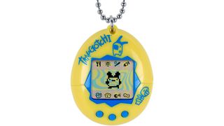 A yellow and blue tamagotchi - one of the best-selling toys of all time