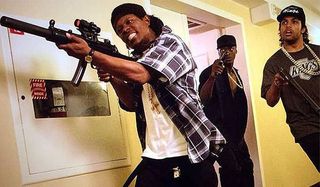 Eazy-E, Ice Cube and MC Ren pull guns in a hotel in Straight Out Of Compton