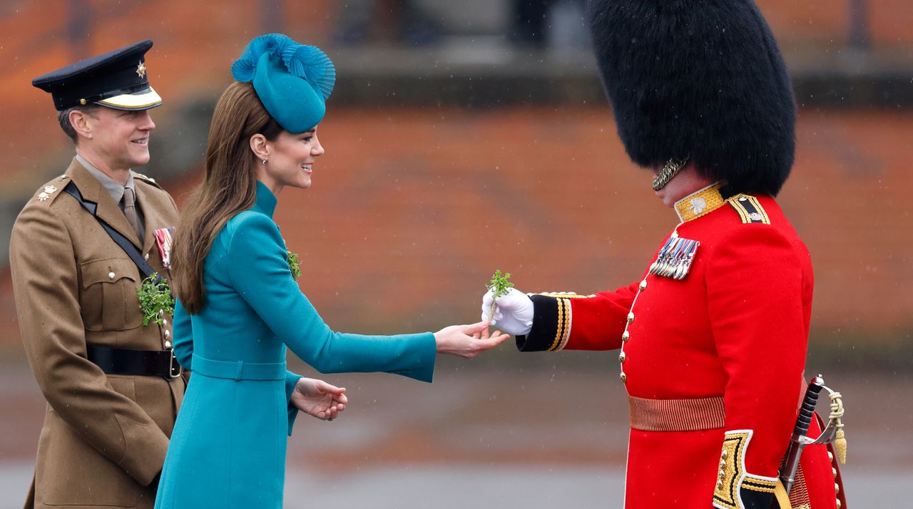  Catherine, Princess of Wales (in her role as Colonel of the Irish Guards) presents traditional sprigs of shamrock to Officers and Guardsmen of the Irish Guards as she attends the 2023 St. Patrick&#039;s Day Parade at Mons Barracks on March 17, 2023 in Aldershot, England