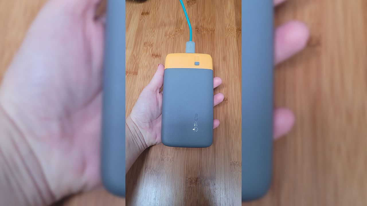 The BioLite Charge PD being held in a ladies palm