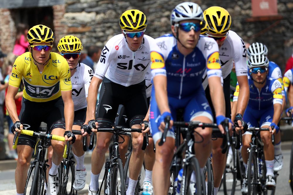 Chris Froome's Team Sky leads the peloton rides towards Raidillon Eau Rouge on Circuit de Spa-Francorchamps during stage three of the 2017 Le Tour de France