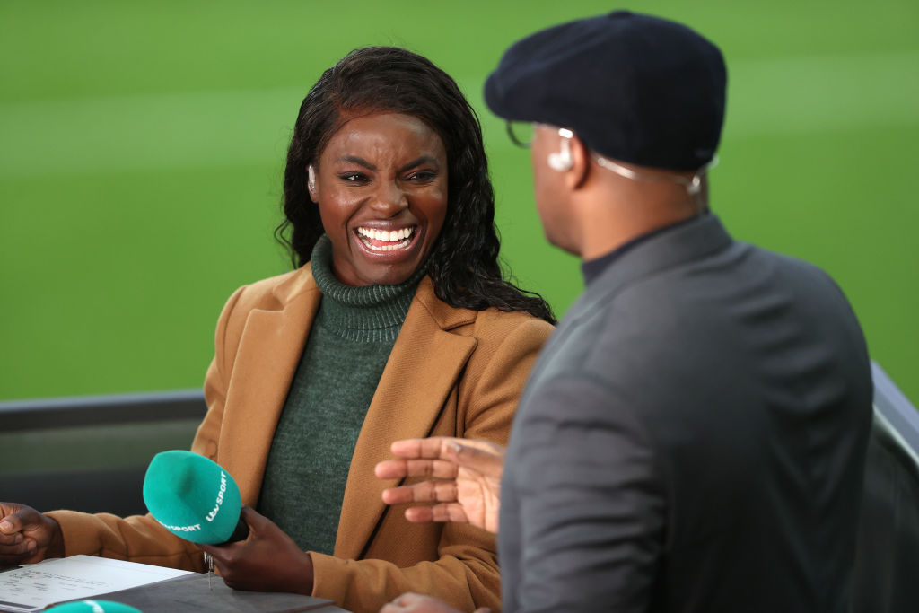ITV pundit Eni Aluko laughs as she speaks with Ian Wright during the Arnold Clark Cup match between England Lionesses and Spain at Carrow Road on February 20, 2022 in Norwich, England.