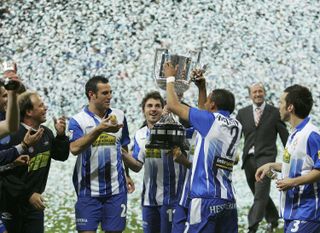 Espanyol players celebrate with the trophy after a 4-1 win over Real Zaragoza in the 2006 Copa del Rey final.