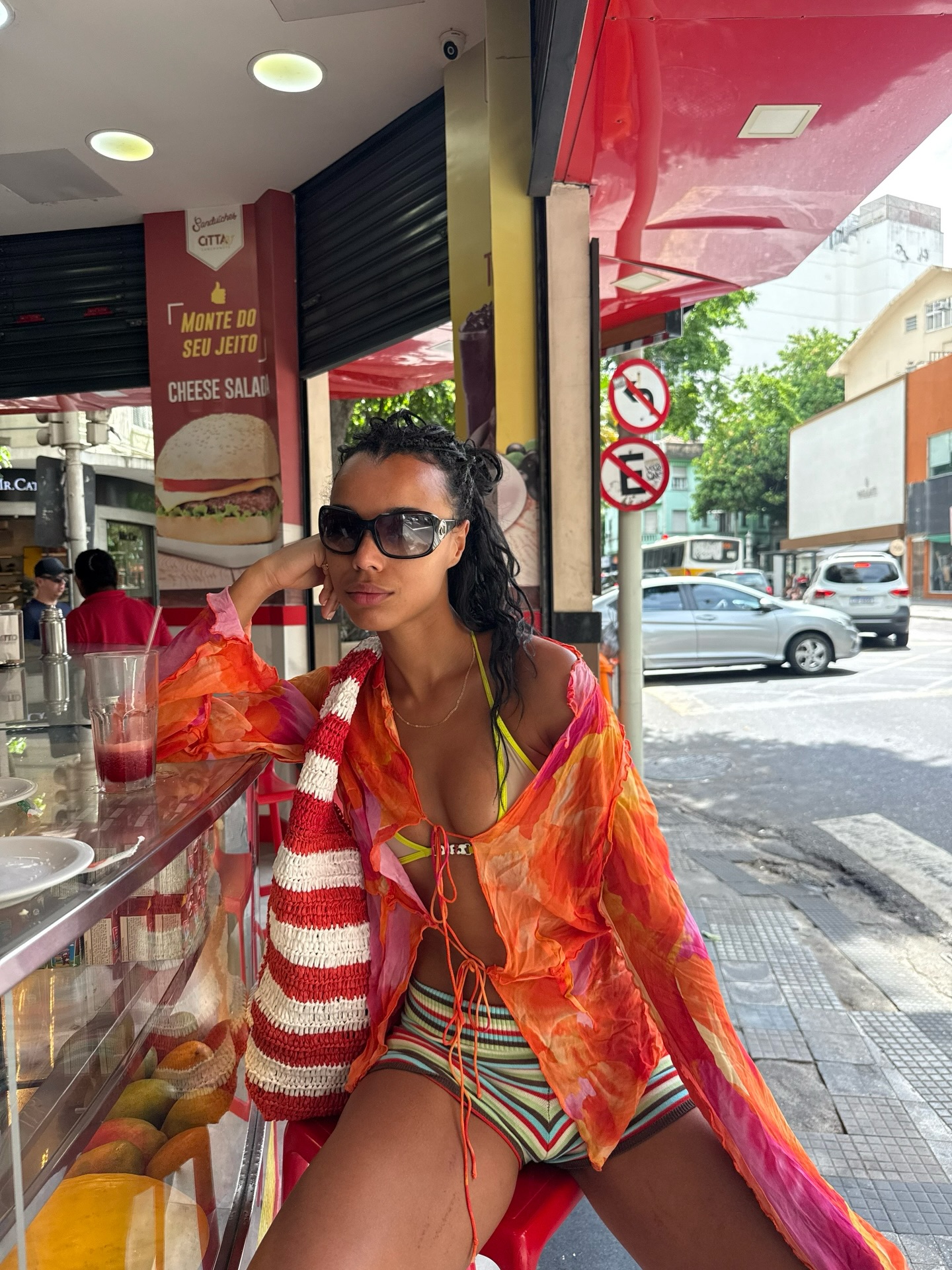 An image of a woman wearing colorful micro shorts trend summer 2026