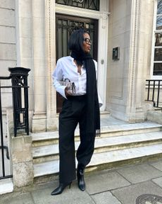 @nlmarilyn wearing ankle boots with black trousers and shirt