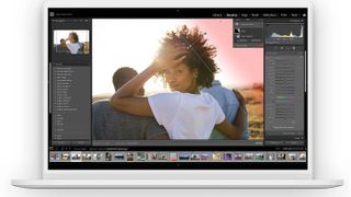 The best Adobe Photography Plan deals for Photoshop and Lightroom: Lightroom Classic interface showing photo of woman and two men walking in the sunshine