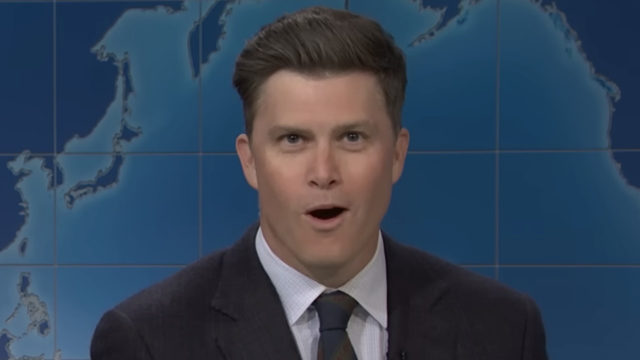 Colin Jost with mouth open in shock after joke on Saturday Night Live Weekend Update Season 51