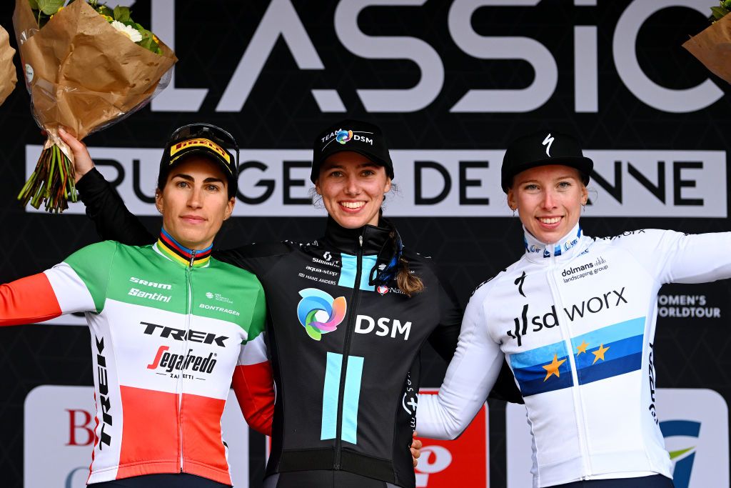 DE PANNE BELGIUM MARCH 23 LR Elisa Balsamo of Italy and Team Trek Segafredo on second place race winner Pfeiffer Georgi of United Kingdom and Team DSM and Lorena Wiebes of The Netherlands and Team SD Worx on third place celebrate on the podium ceremony after the 6th Exterioo Womens Classic BruggeDe Panne 2023 a 1631km one day race from Brugge to De Panne UCIWWT on March 23 2023 in De Panne Belgium Photo by Luc ClaessenGetty Images