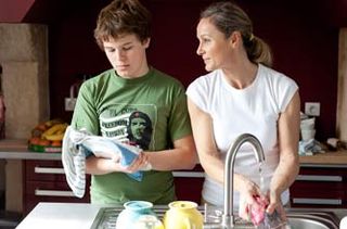 Mum and son doing the washing up