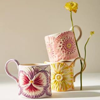 Assorted flower design mugs in cheerful brights