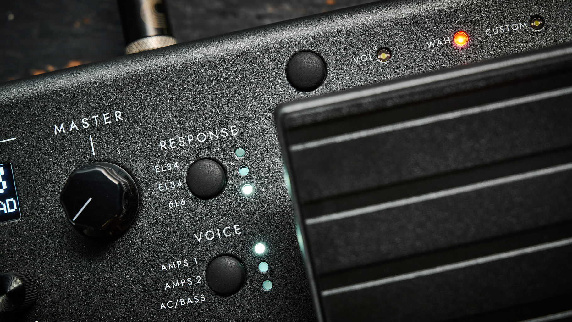 Close up of the 'response' and 'voice' buttons on the Blackstar ID:X Floor Three amp modeller