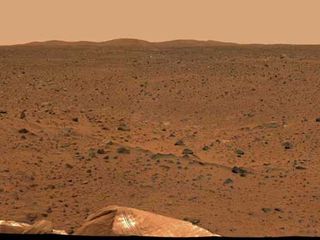 This is a portion of the first 360-degree view of the martian surface taken by Spirit's panoramic camera. Part of the spacecraft can be seen in the lower part of the image. Photo