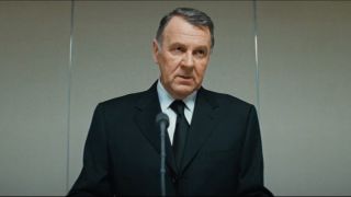 Tom Wilkinson speaking to his staff in Duplicity.