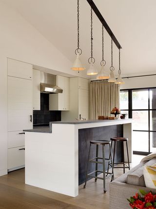 White modern kitchen with Two-tier kitchen islands