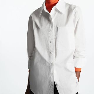 model wearing cos oversized white cotton shirt