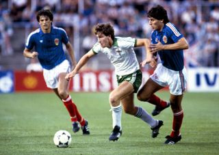 Norman Whiteside in action for Northern Ireland against Yugoslavia at the 1982 World Cup.