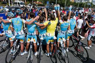 The Astana team pose for many photos after their success in Hainan.