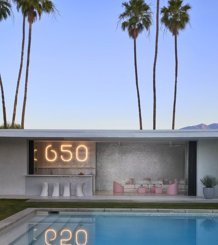Pool and seating area at revamped midcentury Californian home