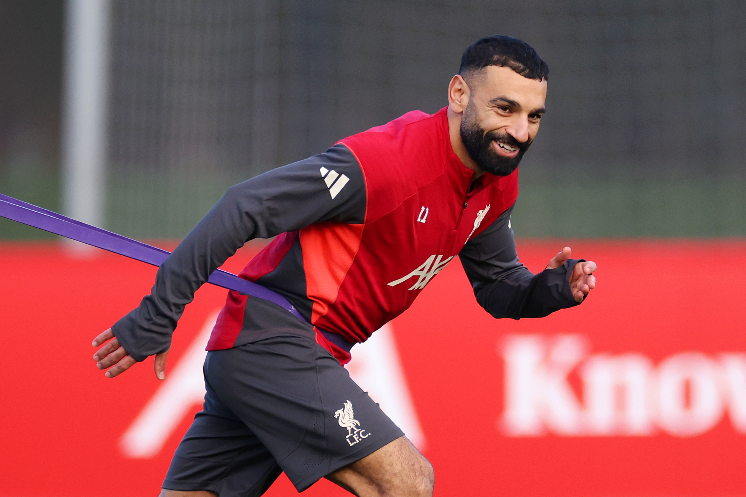 KIRKBY, ENGLAND - DECEMBER 08: Mohamed Salah of Liverpool smiles as he trains during a Liverpool Training Session at AXA Training Centre on December 08, 2025 in Kirkby, England. (Photo by Lewis Storey/Getty Images)