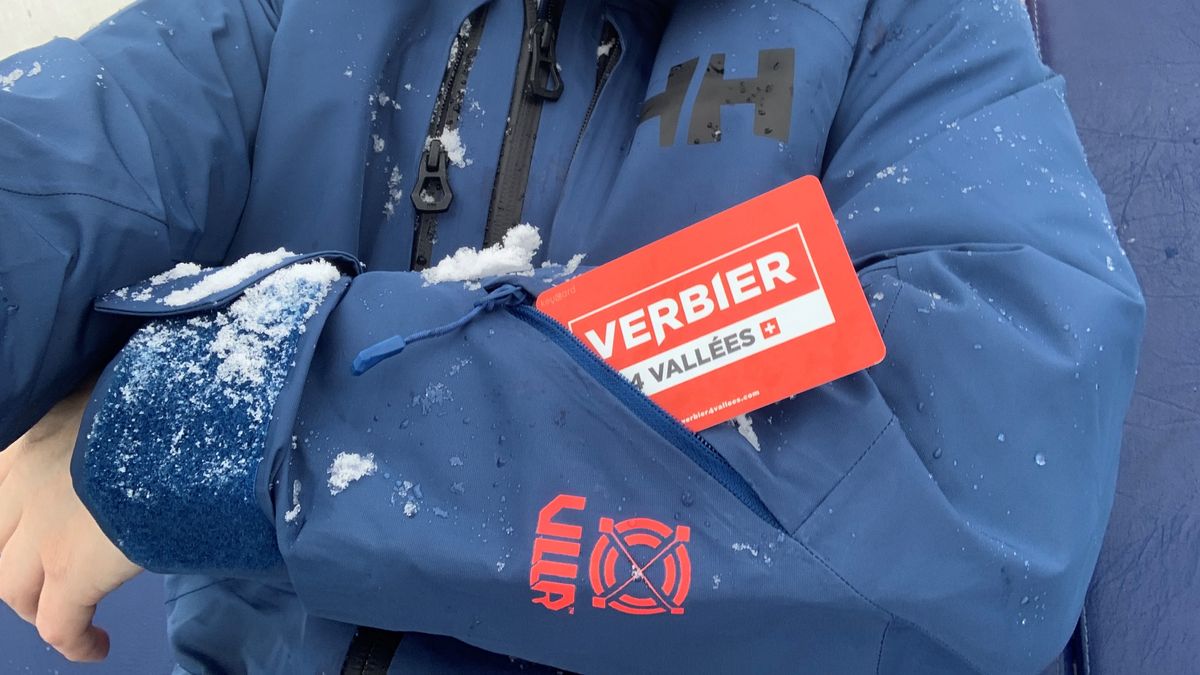 The sleeve pocket on this jacket with a ski pass poking out