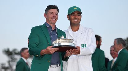 Rory McIlroy and Harry Diamond hold the Masters trophy