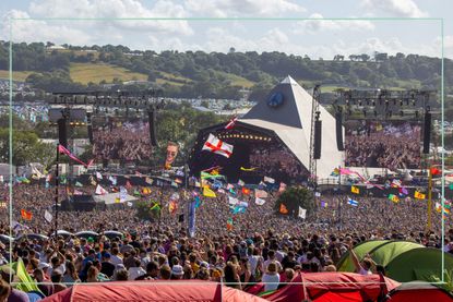 A crowd around the Pyramid Stage at Glastonbury