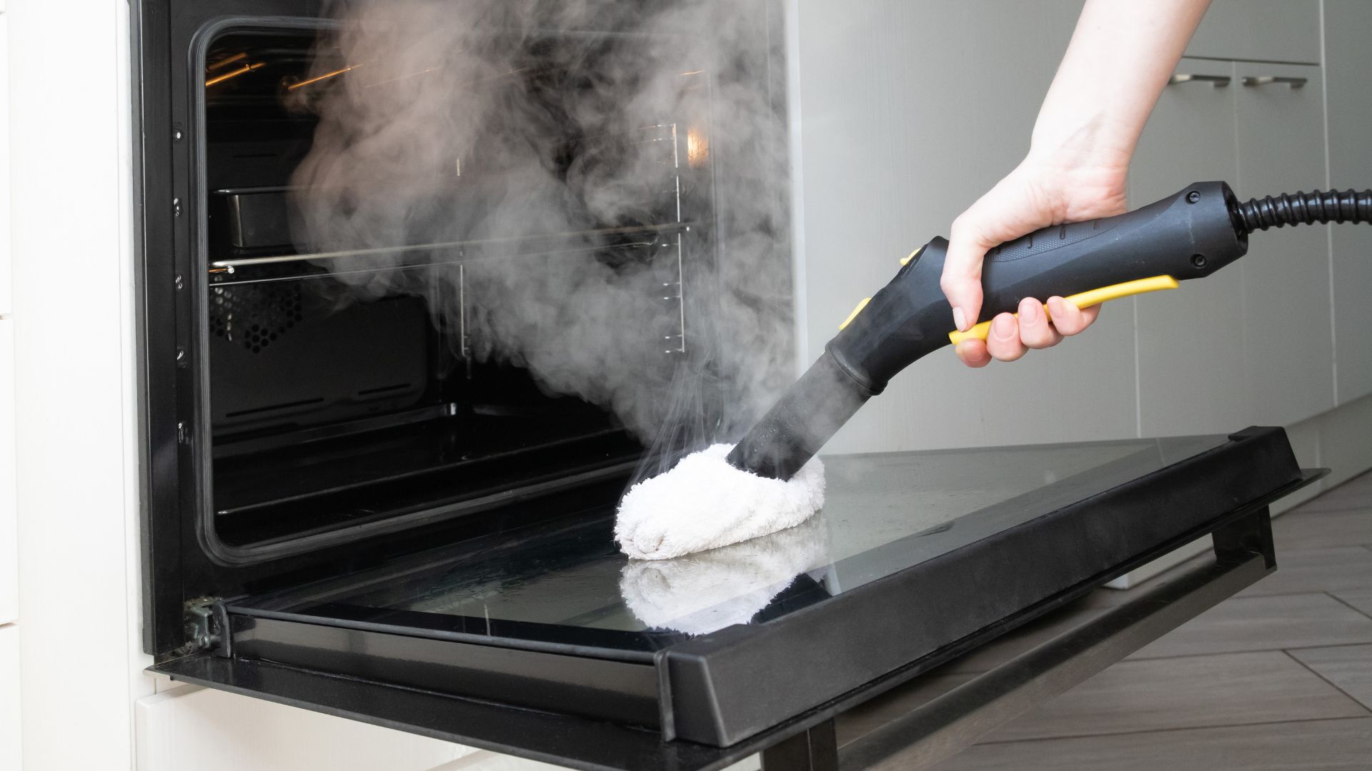 A steam cleaner being used at home