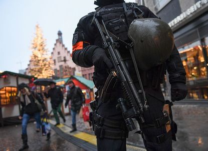 Police in Berlin guard market where deadly truck attack happened