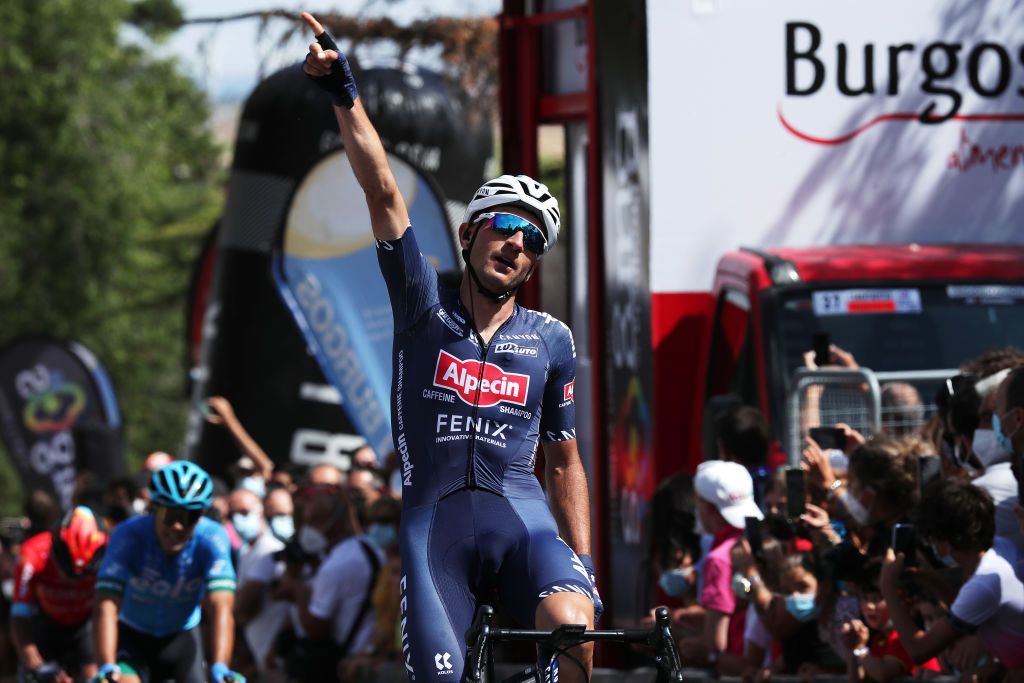 BURGOS SPAIN AUGUST 03 Planckaert Edward of Belgium and Team AlpecinFenix celebrates at finish line as stage winner during the 43rd Vuelta a Burgos 2021 Stage 1 a 161km stage from BurgosCatedral to BurgosAlto del Castillo 980m VueltaBurgos BurgosCycling CapitalMundialdelCiclismo catedral2021 on August 03 2021 in Burgos Spain Photo by Gonzalo Arroyo MorenoGetty Images