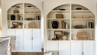 Arched storage unit with open shelves decorated with ornaments