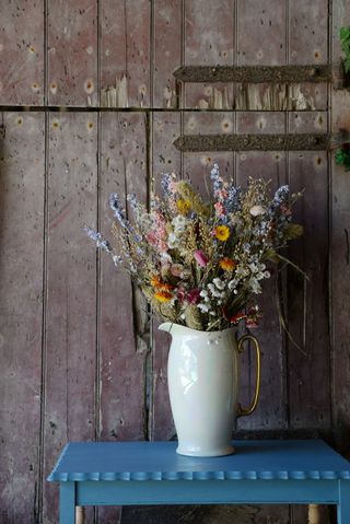 Dried flowers in a vintage jug