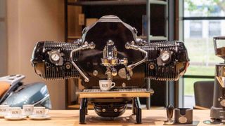 BMW Boxer espresso machine on counter with espresso cups and coffee grinder