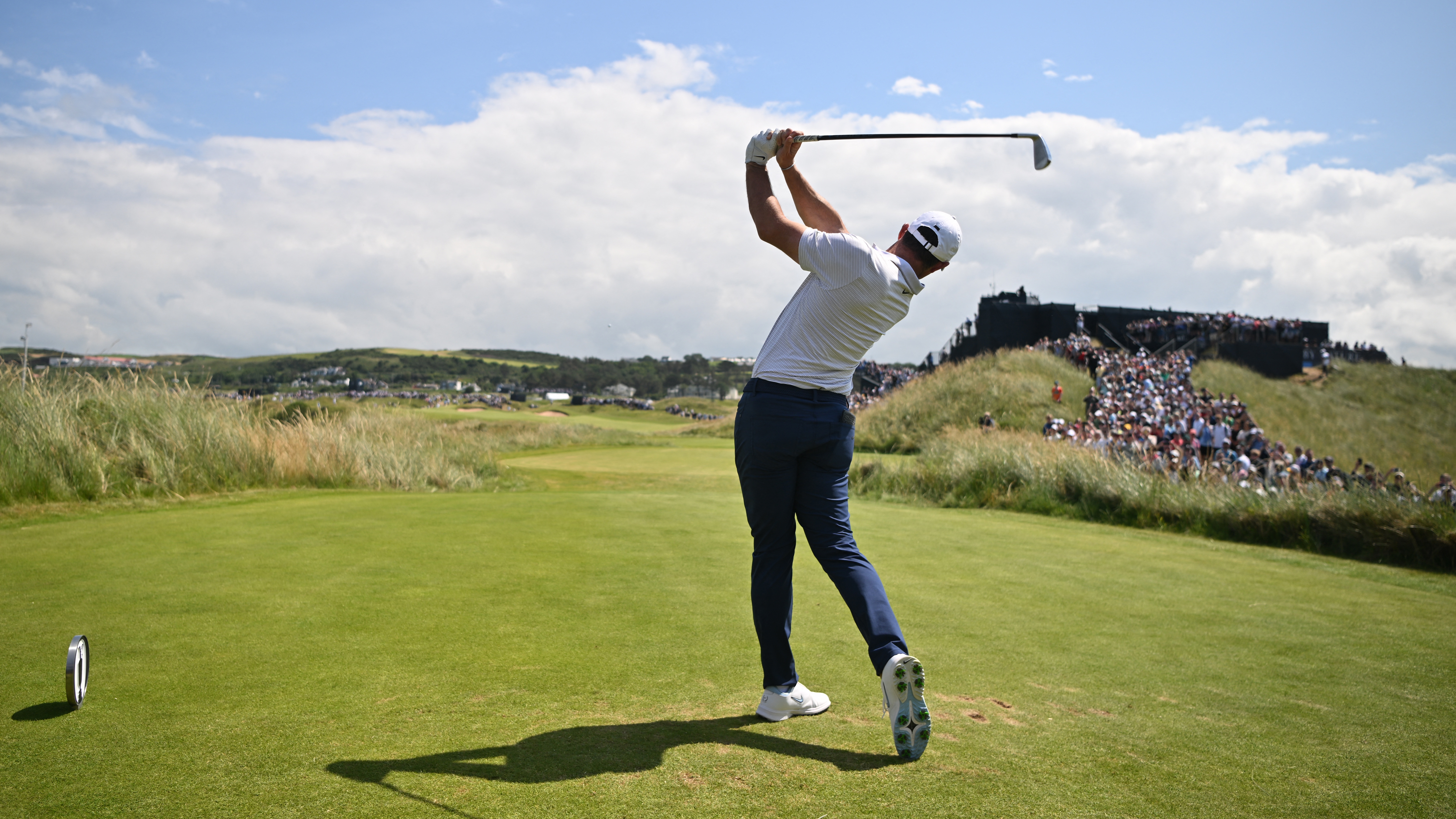 Northern Ireland&#039;s Rory McIlroy plays from the 8th tee during practice ahead of the 153rd Open Championship at Royal Portrush golf club in Northern Ireland on July 16, 2025