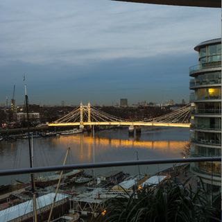 river thames bridge with lights and ships