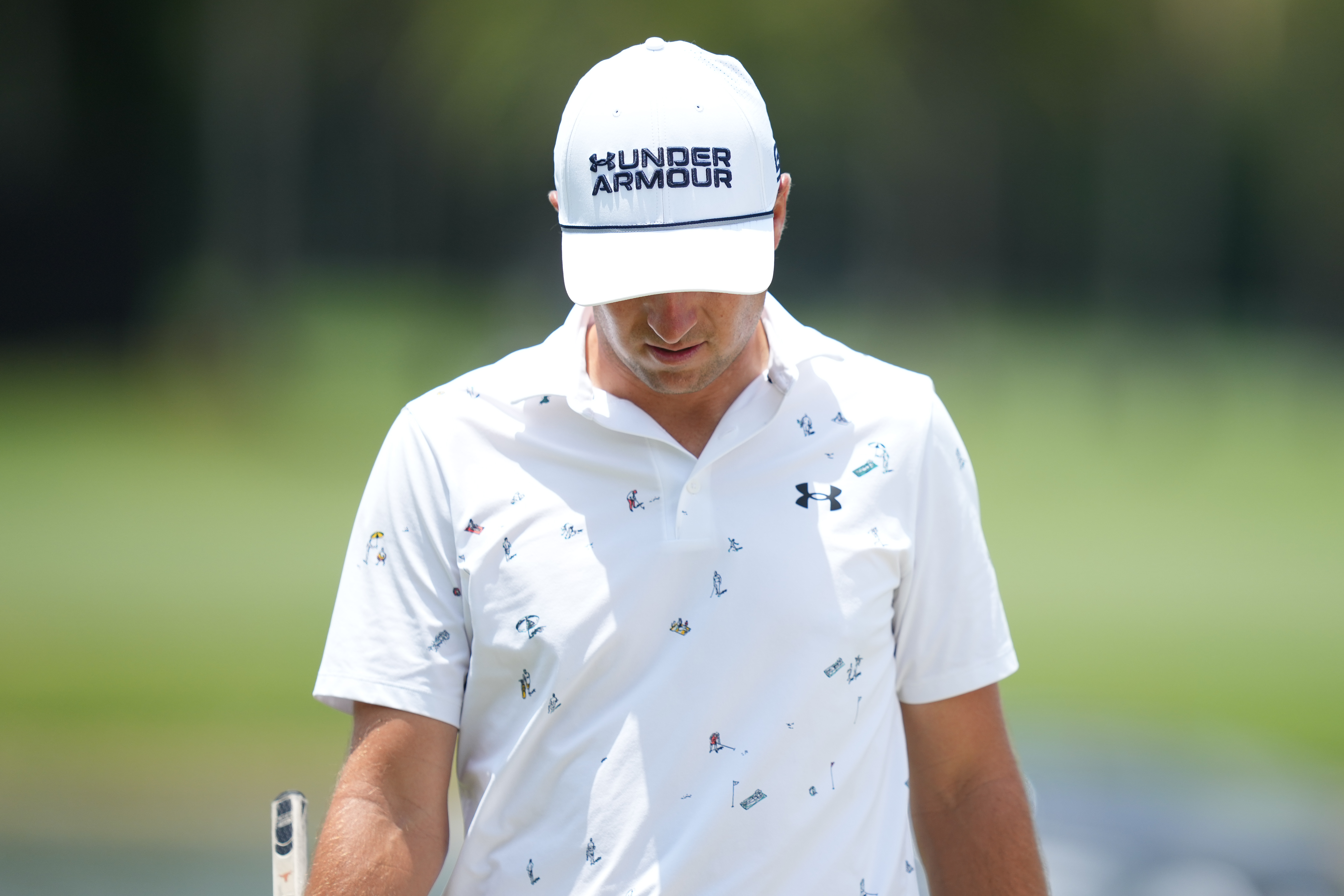 Jordan Spieth walks on the ninth green during the first round of Cadillac Championship at Trump National Doral - Blue Monster Course