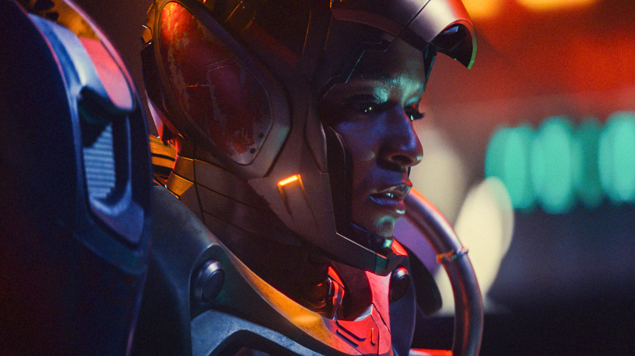 Close up of Riri Williams (Dominique Thorne) in the Ironheart suit in a scene from Marvel's "Ironheart"