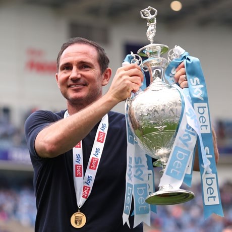 Coventry City Manager Frank Lampard celebrates with the Championship trophy. (Photo by Marc Atkins/Getty Images)