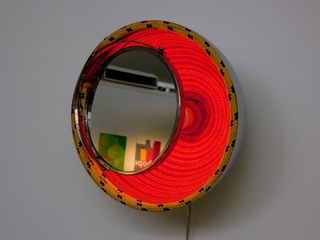 View of a circular piece made from rope and a mirror by Brazilian designer Rodrigo Almeida