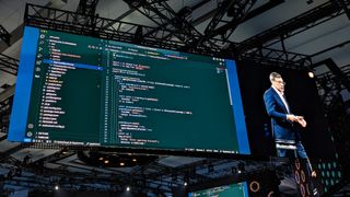 A screen showing AI code pair programming within NetSuite, at SuiteWorld 2023.