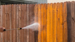 Cleaning fence with a pressure washer