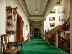 Fig 2: The landing of the main stair, with its carved Victorian balustrade in late-17th-century style. Cluny Castle in Aberdeenshire. ©Paul Highnam for Country Life