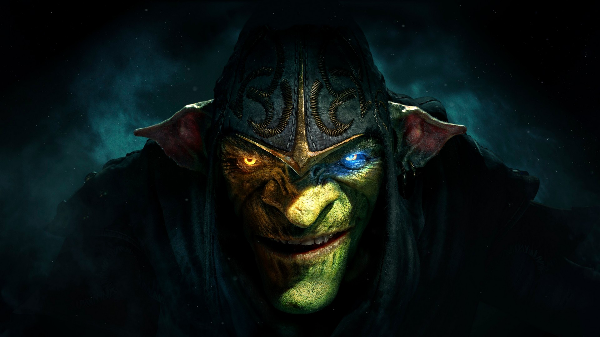 A close-up of Styx looking up from under his hood in darkness, one eye glowing amber, and the other light blue