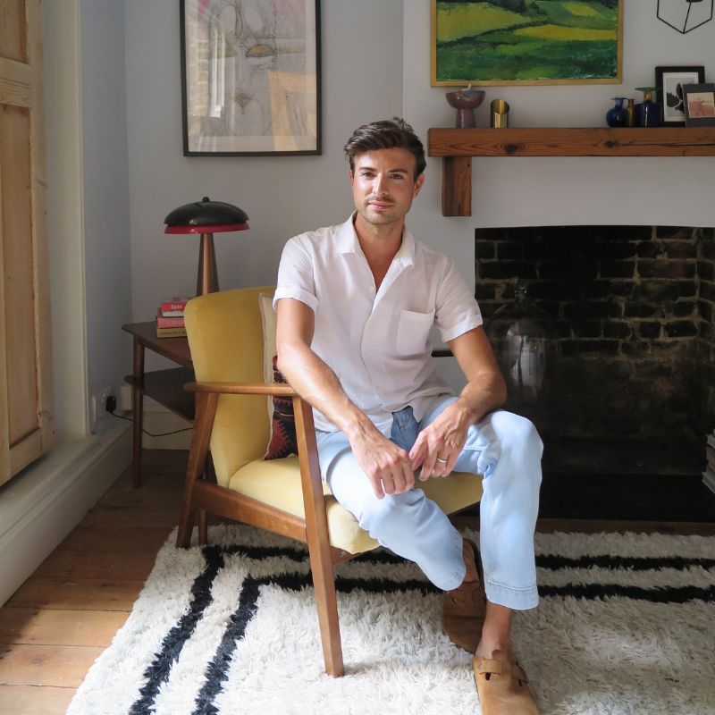 picture of Kai Price sitting on yellow chair
