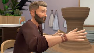 Sims 4 Businesses and Hobbies - A sim molds a clay pot on a pottery wheel