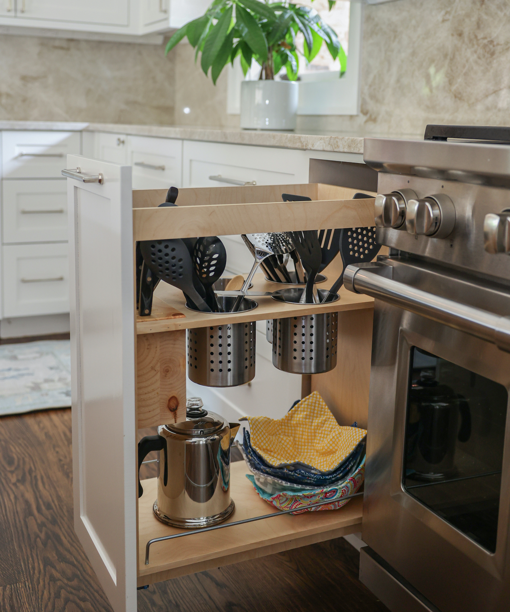 kitchen with pull out storage open next to the oven