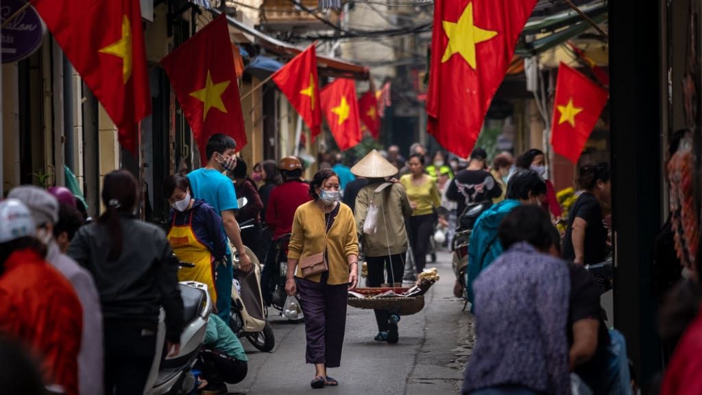 People wearing masks in Hanoi.