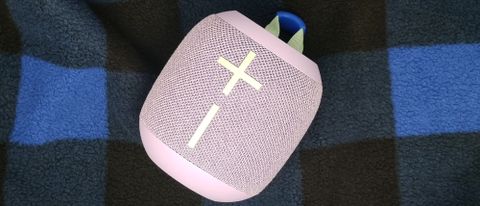 The Ultimate Ears Wonderboom 3 on a chequered background