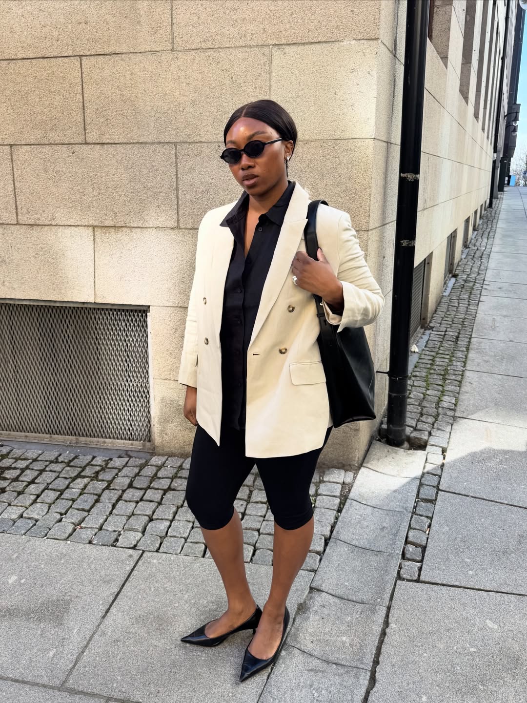 Nnenna in a linen blazer and capris