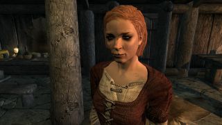 Best Skyrim mods — A tavern NPC with improved clothing textures.